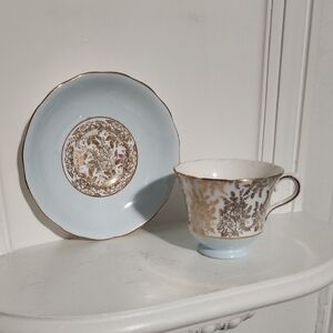 This is a vintage Royal Vale  bone china teacup and saucer England